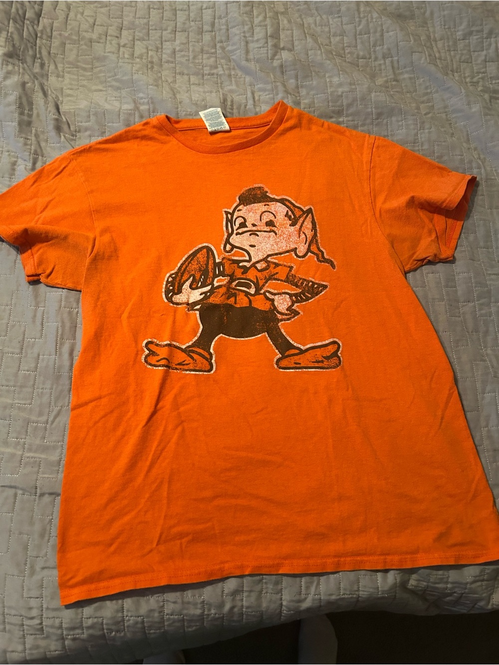 Delta Orange Graphic Tee with Elf Football Character